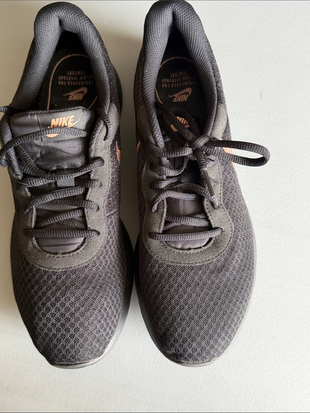 Nike Women’s Black Athletic Sneakers with Copper Accents